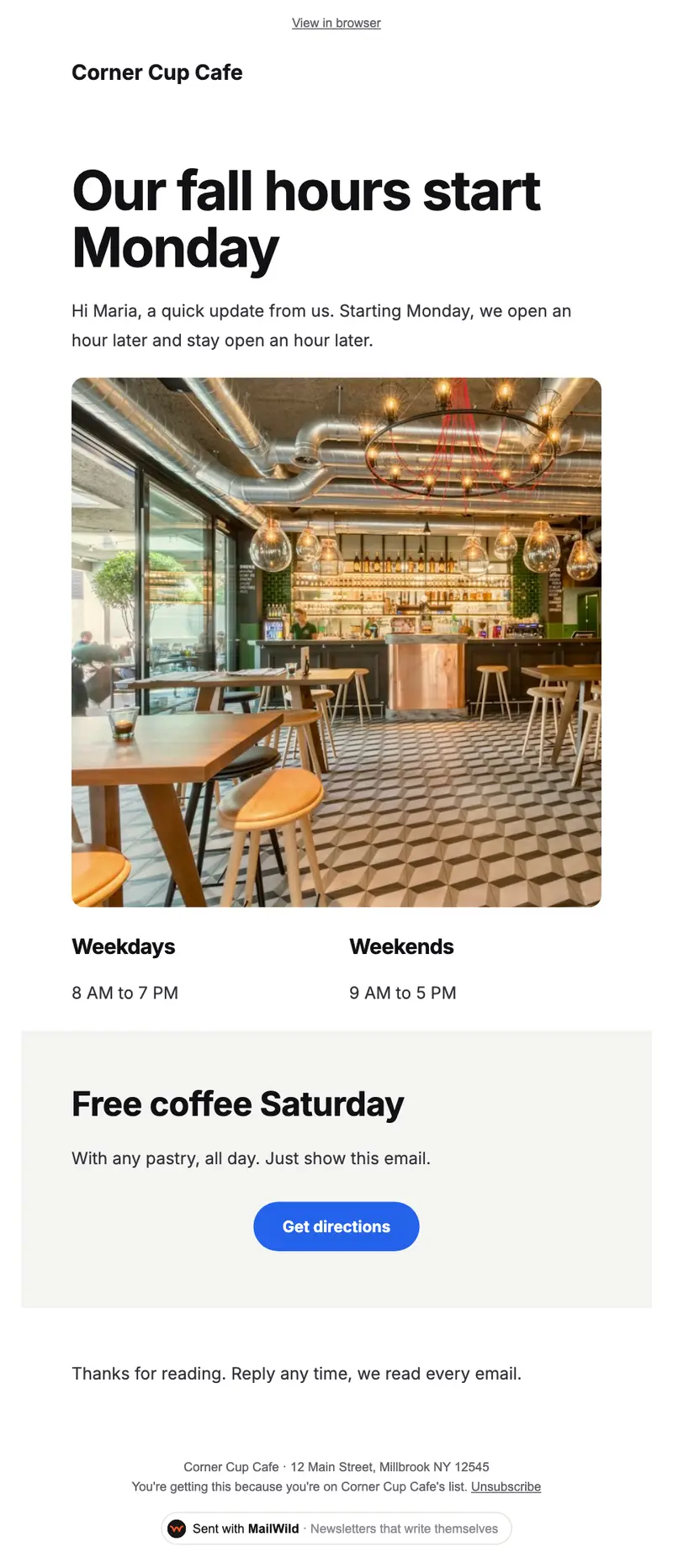 A MailWild newsletter in the Clean look: a bold headline, a cafe photo, weekday and weekend hours side by side, a grey band with a blue Get directions button, and the unsubscribe footer.
